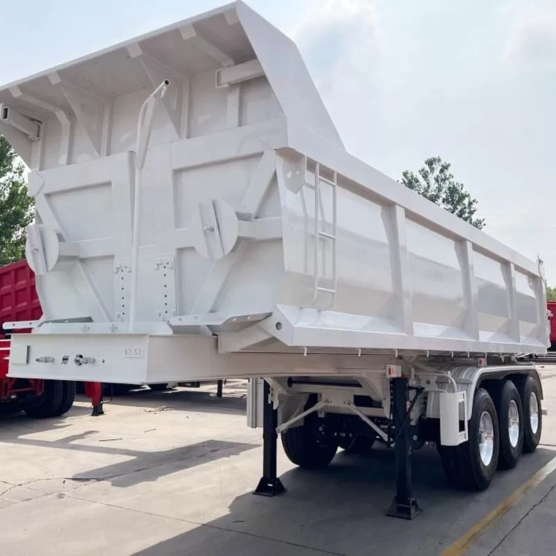 steel 30-80 ton payload 3-axle 9500 mm length self-dumping semi-trailer, for use in mining areas.