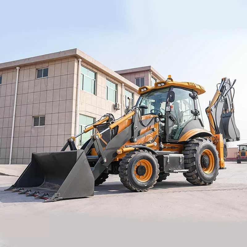Electric four-wheel drive compact tractor with front loader and backhoe.