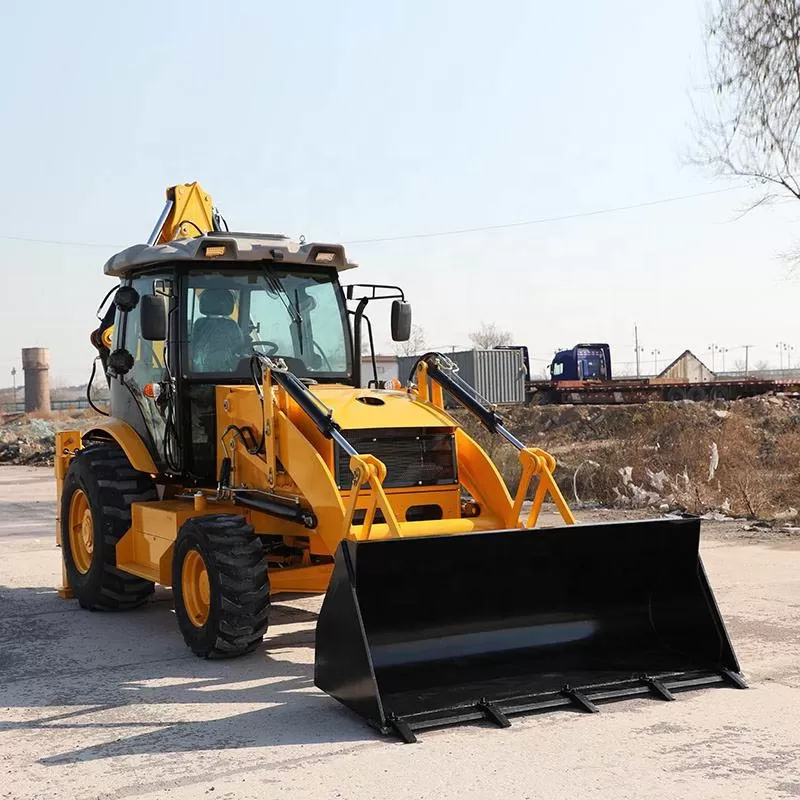 Construction equipment wheeled loader with backhoe and compact backhoe.