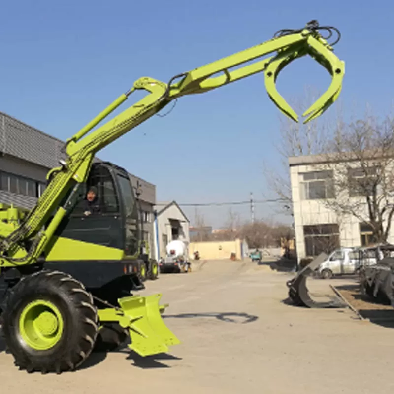 Cargadora peque&ntilde;a de ca&ntilde;a de az&uacute;car con cuchara, fabricada en China.