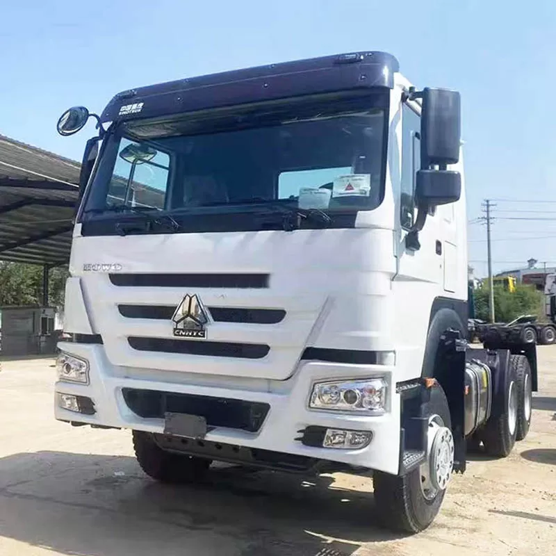 Used China National Heavy Duty Truck (CNHTC) HOWO 6x4 Diesel Tractor Unit from Shandong, China, equipped with a Weichai engine.