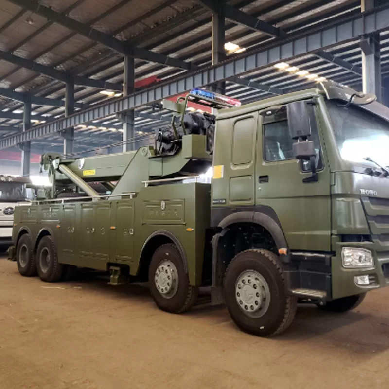 شاحنات المساعدة والإنقاذ الثقيلة HOWO 30t 50t، وشاحنات السحب، والمقطورات لإزالة الحواجز على الطرق.