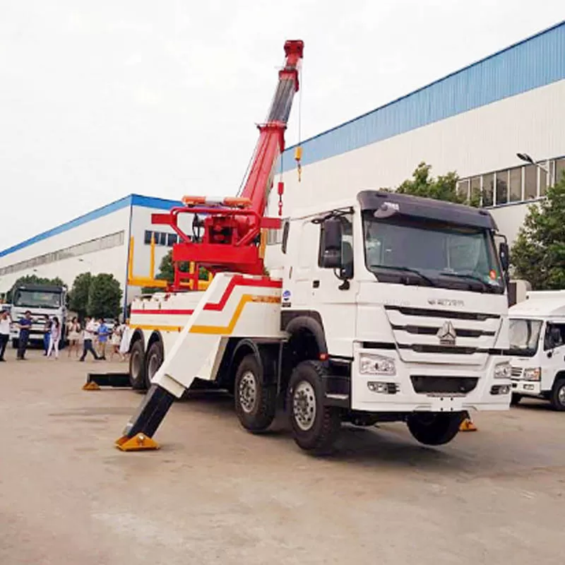 Sinotruk HOWO Full-Rotation Tow Truck: Integrated Towing, Lifting, and Recovery Vehicle for Bus and Heavy Vehicle Rescue Operations