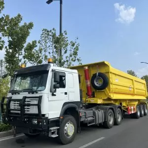 High-quality rear-dump trailers for transporting gravel and sand.